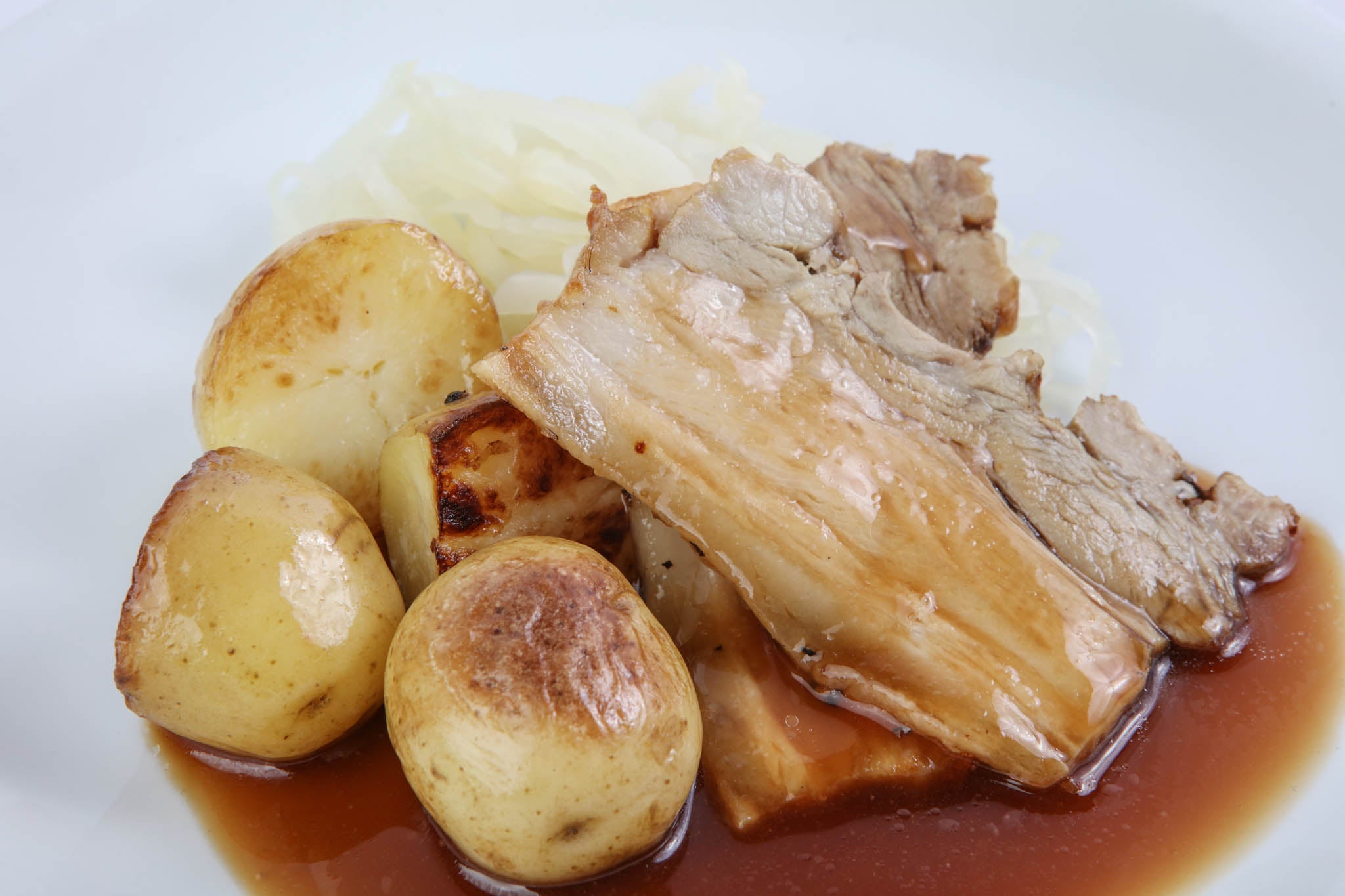 Honey Glazed Pork with roast New Potatoes, Cabbage & Gravy